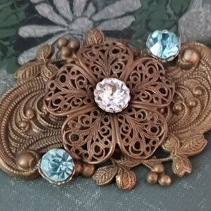Vintage Floral Bronze Brooch with Blue Jewel Accents